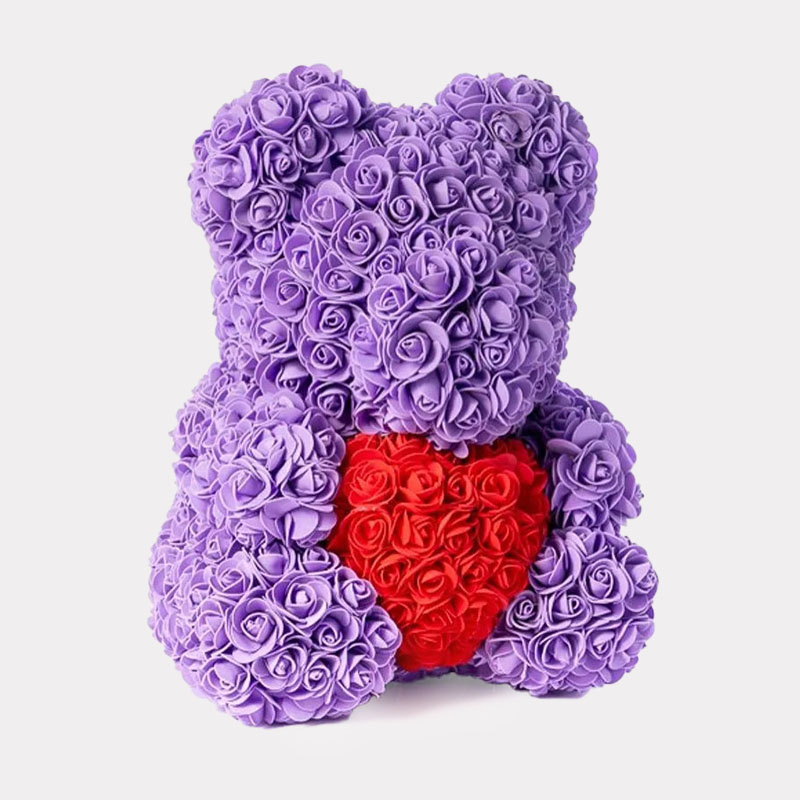 Rosen Teddybaer lavendel mit rotem Herz 25cm Rosen Teddybaer lavendel mit rotem Herz 25cm